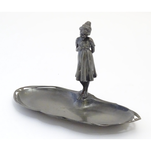 1002 - A WMF Art Nouveau / Jugendstil cast visiting card tray with central young girl, the tray of shaped f... 