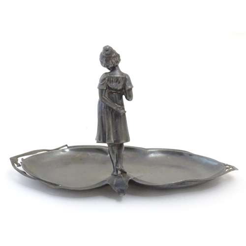 1002 - A WMF Art Nouveau / Jugendstil cast visiting card tray with central young girl, the tray of shaped f... 