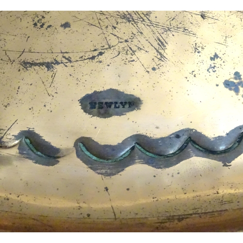 1003 - An Arts & Crafts Newlyn School copper dish / charger of circular form with lobed banded decoration. ... 