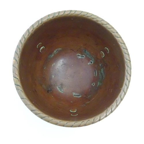 1003 - An Arts & Crafts Newlyn School copper dish / charger of circular form with lobed banded decoration. ... 