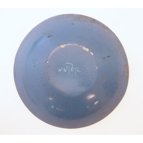 1007 - A 20thC blue enamel bowl by Edward Winter, with stylised foliate decoration. Signed under. Approx. 2... 