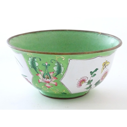 1035 - A Chinese / Cantonese famille verte bowl with enamel detail, decorated with a bird on a peony branch... 