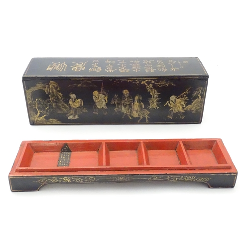 1057 - Four Oriental lacquered items comprising a desk tidy / organiser with shaped back decorated with a w... 