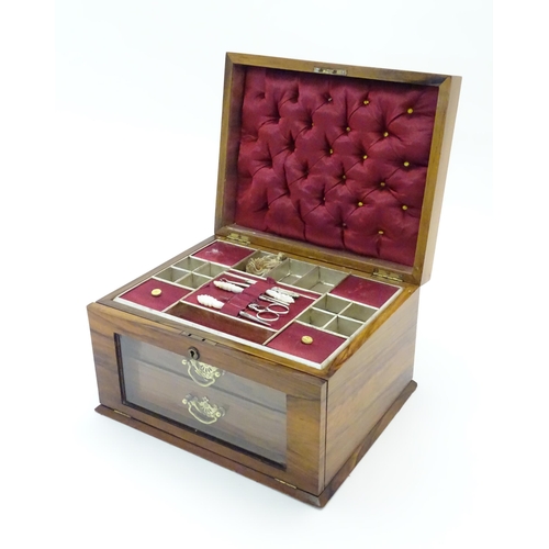 1061 - An early 20thC walnut vanity case / sewing box with fitted lift out tray to interior above two drawe... 