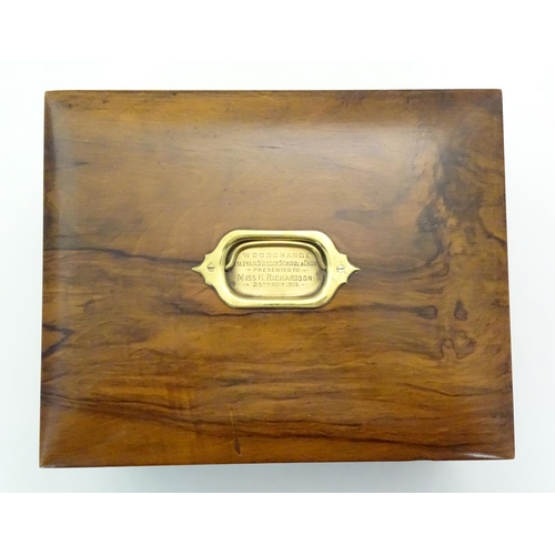 1061 - An early 20thC walnut vanity case / sewing box with fitted lift out tray to interior above two drawe... 