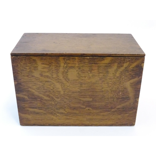 1064 - A 20thC oak correspondence / address box. Approx. 6