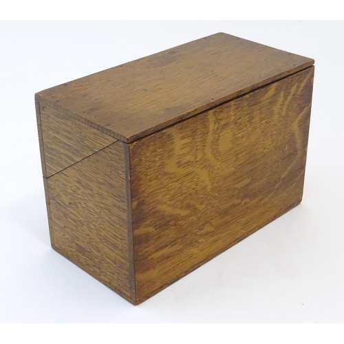 1064 - A 20thC oak correspondence / address box. Approx. 6