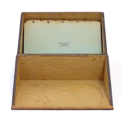 1064 - A 20thC oak correspondence / address box. Approx. 6