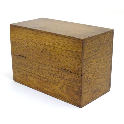 1064 - A 20thC oak correspondence / address box. Approx. 6