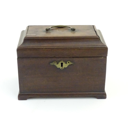 1071 - An 18thC mahogany tea caddy with handle to lid. Approx. 6 1/2