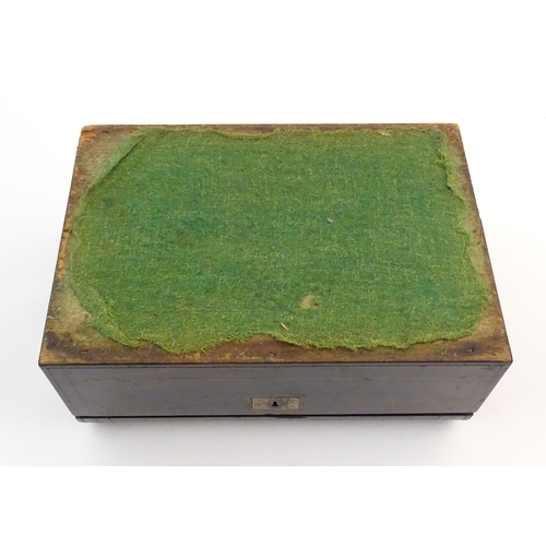 1073 - A Victorian coromandel writing slope / box with brass stringing detail. Inset maker's plaque within,... 