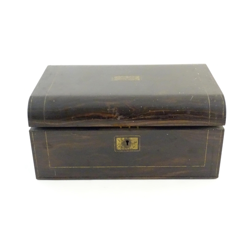 1073 - A Victorian coromandel writing slope / box with brass stringing detail. Inset maker's plaque within,... 