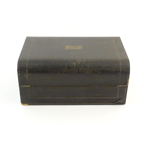 1073 - A Victorian coromandel writing slope / box with brass stringing detail. Inset maker's plaque within,... 