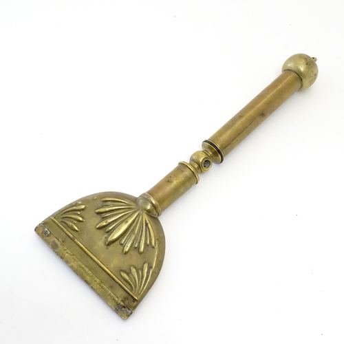 1075 - A 19thC brass horse hair singer / singeing lamp with embossed shell detail. Approx. 13 3/4