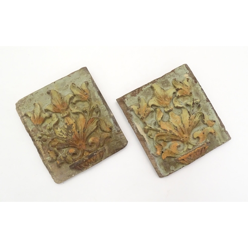 1077 - A pair of early 19thC carved wooden plaques of rectangular form with relief foliate and urn detail w... 