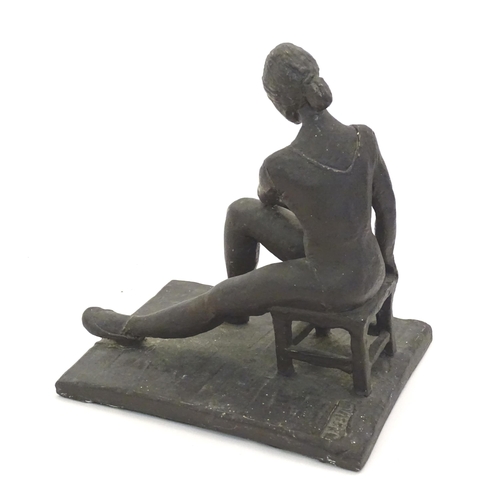 1083 - A 20thC clay sculpture modelled as a seated ballerina. Singed J. Paul to base. Approx. 7 1/4