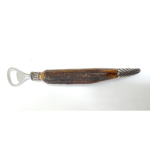 1092 - A Victorian antler handled bottler opener with silver collar and mount, hallmarked Sheffield 1888, m... 