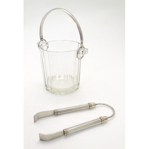 1106 - A 20thC glass and silver plate ice bucket with swing handle and silver plate tongs. Bucket approx. 5... 