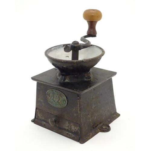 1107 - A Victorian cast iron coffee grinder / mill, by A. Kenrick & Sons. Approx. 6 1/2