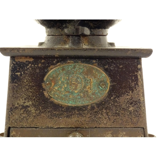 1107 - A Victorian cast iron coffee grinder / mill, by A. Kenrick & Sons. Approx. 6 1/2