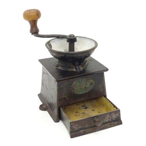 1107 - A Victorian cast iron coffee grinder / mill, by A. Kenrick & Sons. Approx. 6 1/2