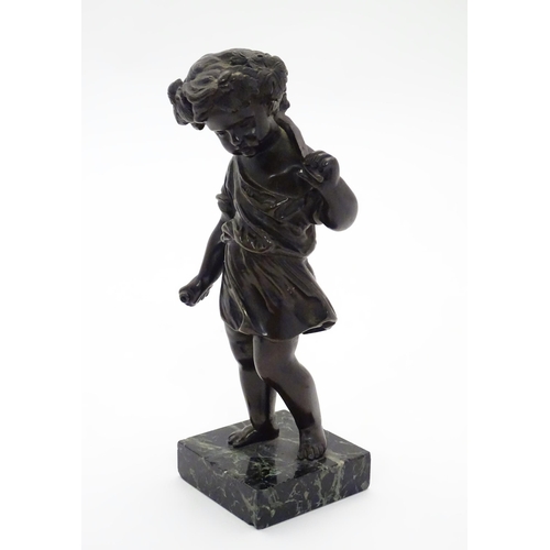 1125 - A late 19thC cast bronze figure of a cherub / putto representing Harvest, holding fruiting vines. On... 