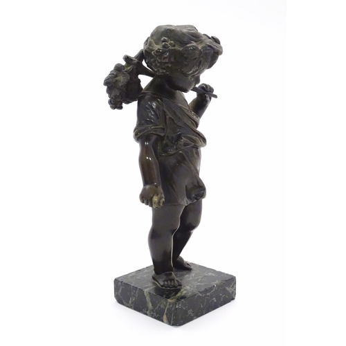 1125 - A late 19thC cast bronze figure of a cherub / putto representing Harvest, holding fruiting vines. On... 