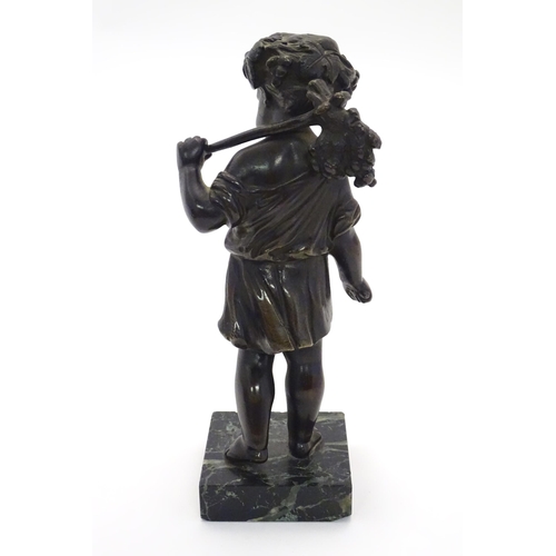 1125 - A late 19thC cast bronze figure of a cherub / putto representing Harvest, holding fruiting vines. On... 