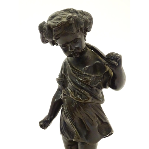 1125 - A late 19thC cast bronze figure of a cherub / putto representing Harvest, holding fruiting vines. On... 