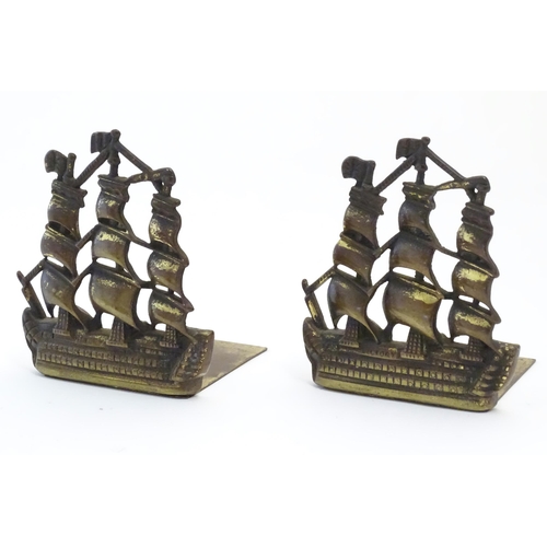 1128 - A pair of 19thC cast brass book ends modelled as the ship HMS Victory in full sail. Approx. 5 1/2