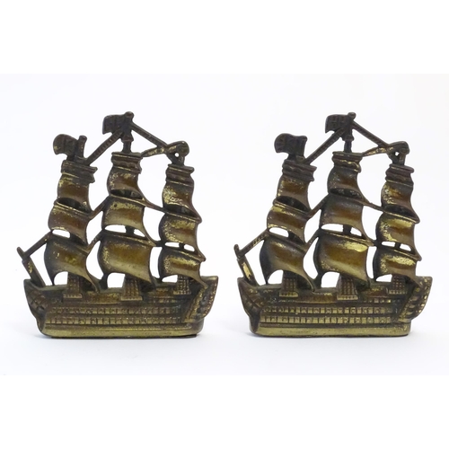 1128 - A pair of 19thC cast brass book ends modelled as the ship HMS Victory in full sail. Approx. 5 1/2