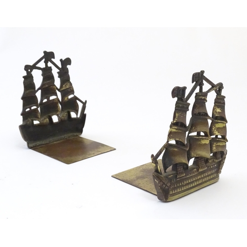 1128 - A pair of 19thC cast brass book ends modelled as the ship HMS Victory in full sail. Approx. 5 1/2