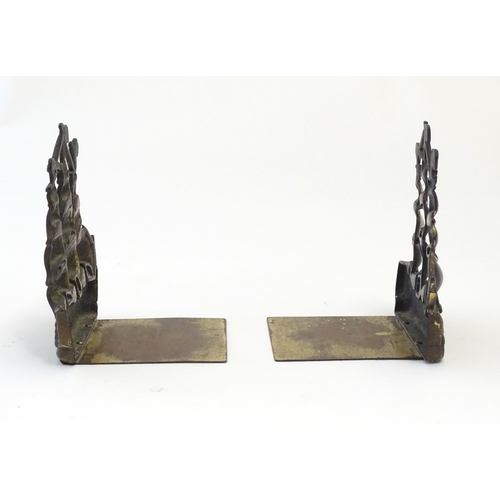 1128 - A pair of 19thC cast brass book ends modelled as the ship HMS Victory in full sail. Approx. 5 1/2