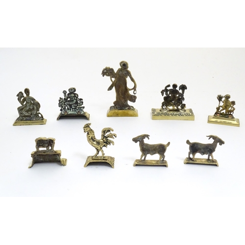 1179 - A quantity of assorted cast brass fireplace / fireside / chimney ornaments to include a Classical la... 