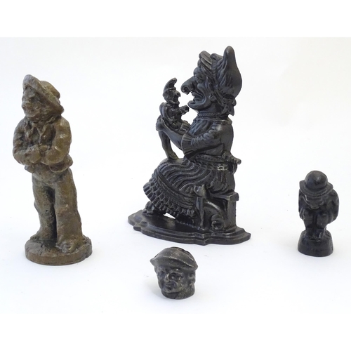 1182 - Four assorted cast fireplace / fireside / chimney ornaments / door stops / porters to include Judy (... 