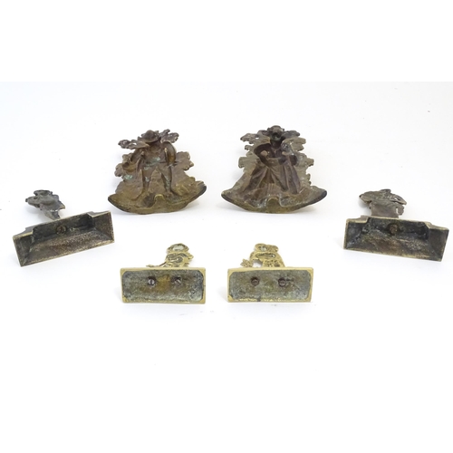 1183 - A quantity of assorted cast brass fireplace / fireside / chimney ornaments to include a pair of hunt... 