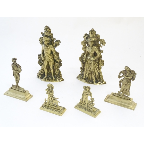 1183 - A quantity of assorted cast brass fireplace / fireside / chimney ornaments to include a pair of hunt... 