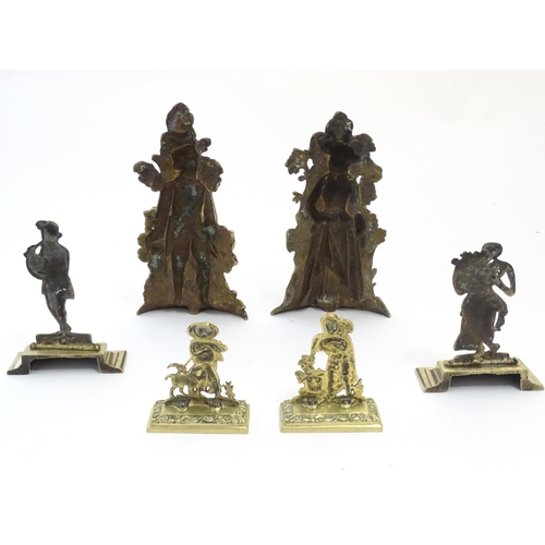 1183 - A quantity of assorted cast brass fireplace / fireside / chimney ornaments to include a pair of hunt... 