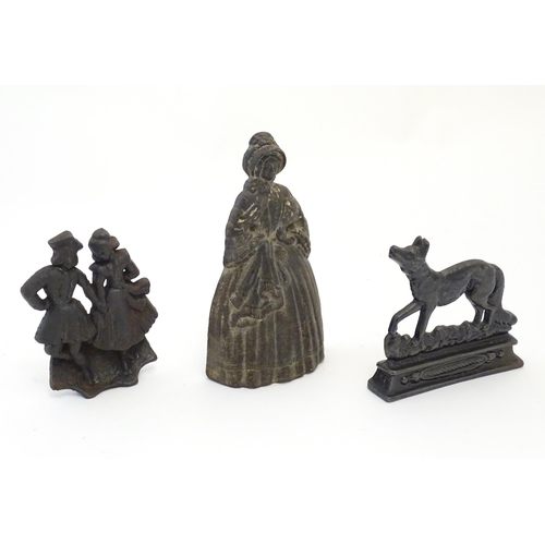 1184 - A quantity of assorted cast fireplace / fireside / chimney ornaments / door stops / porters to inclu... 