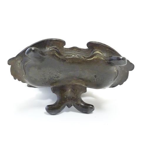 1186 - A late 19th / early 20thC cast pocket watch stand with crested ribboning, flowers and a shaped tray ... 