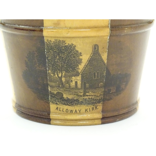 1211 - A 19thC Mauchline ware model of a milk pail with banded detail, decorated with a vignette depicting ... 