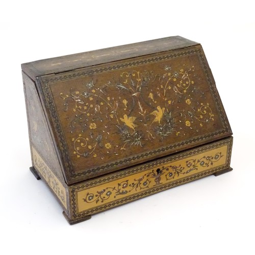 1213 - A 19thC Continental olivewood stationery box with letter rack within, with inlaid decoration depicti... 