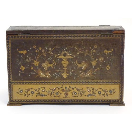 1213 - A 19thC Continental olivewood stationery box with letter rack within, with inlaid decoration depicti... 