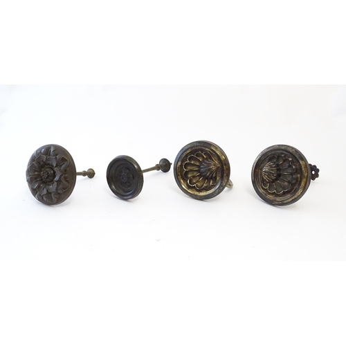 1238 - A pair of late 19th / early 20thC gilt metal curtain tiebacks with shell detail. Together with a sin... 