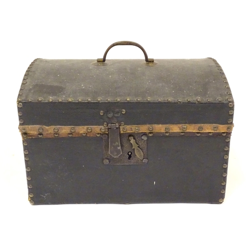 1254 - A 19thC leather covered casket / box with stud detail. Approx. 6 3/4