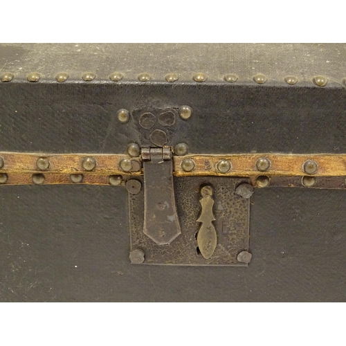 1254 - A 19thC leather covered casket / box with stud detail. Approx. 6 3/4