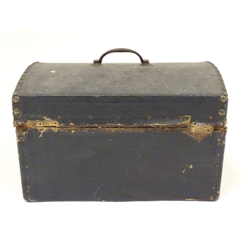 1254 - A 19thC leather covered casket / box with stud detail. Approx. 6 3/4