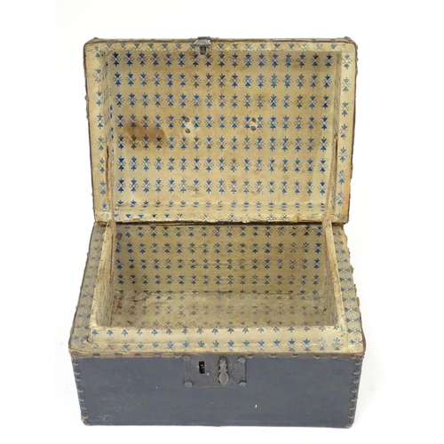 1254 - A 19thC leather covered casket / box with stud detail. Approx. 6 3/4