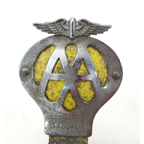 1288 - Automobilia: An early to mid 20thC chromed car / vehicle badge bar, with affixed Lucas 4LR headlamp,... 