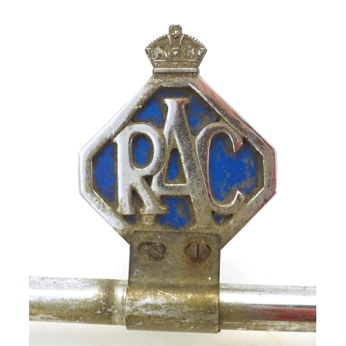 1288 - Automobilia: An early to mid 20thC chromed car / vehicle badge bar, with affixed Lucas 4LR headlamp,... 